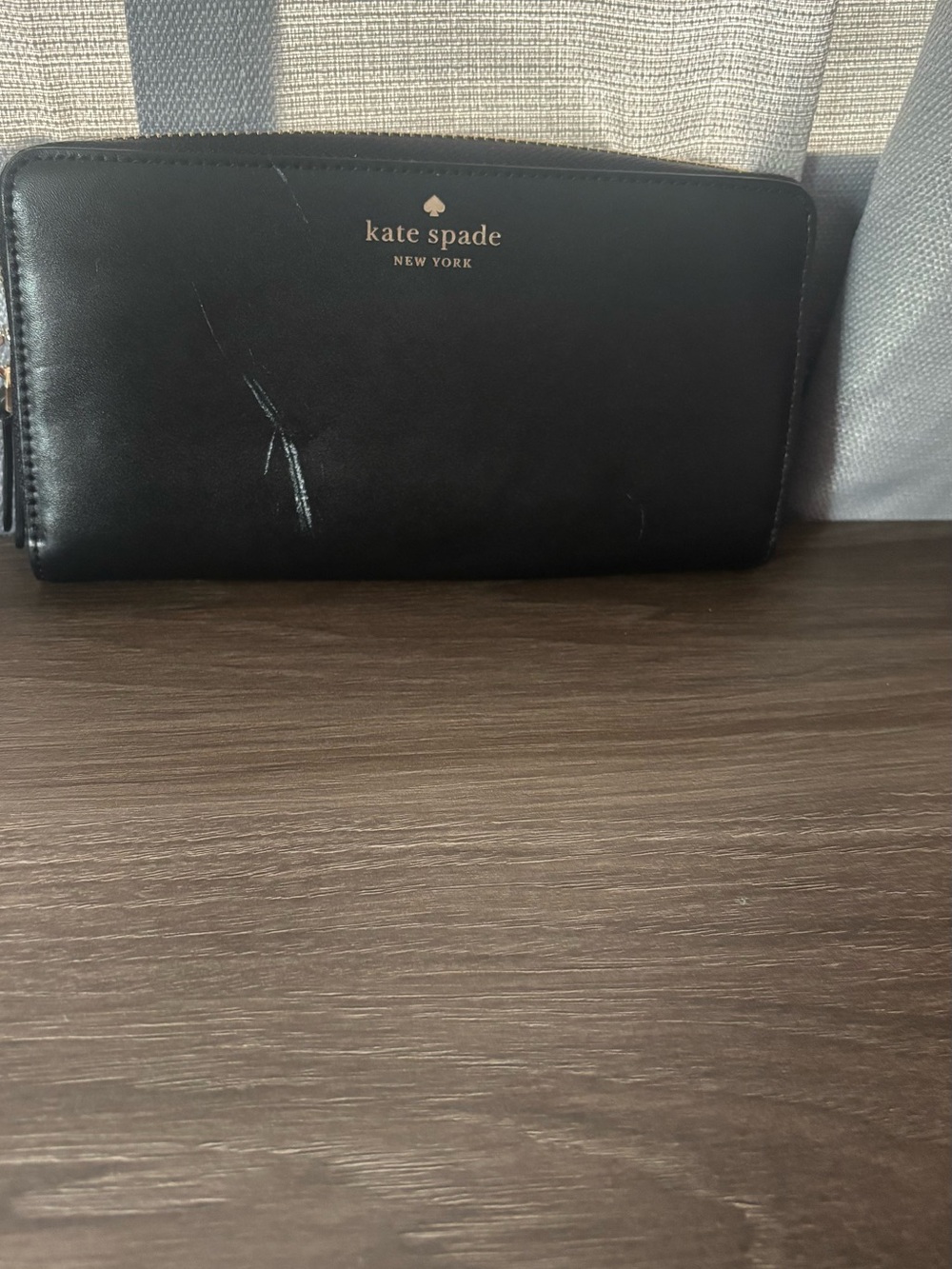 kate spade Black Zip-Around Leather Wallet with Gold Logo